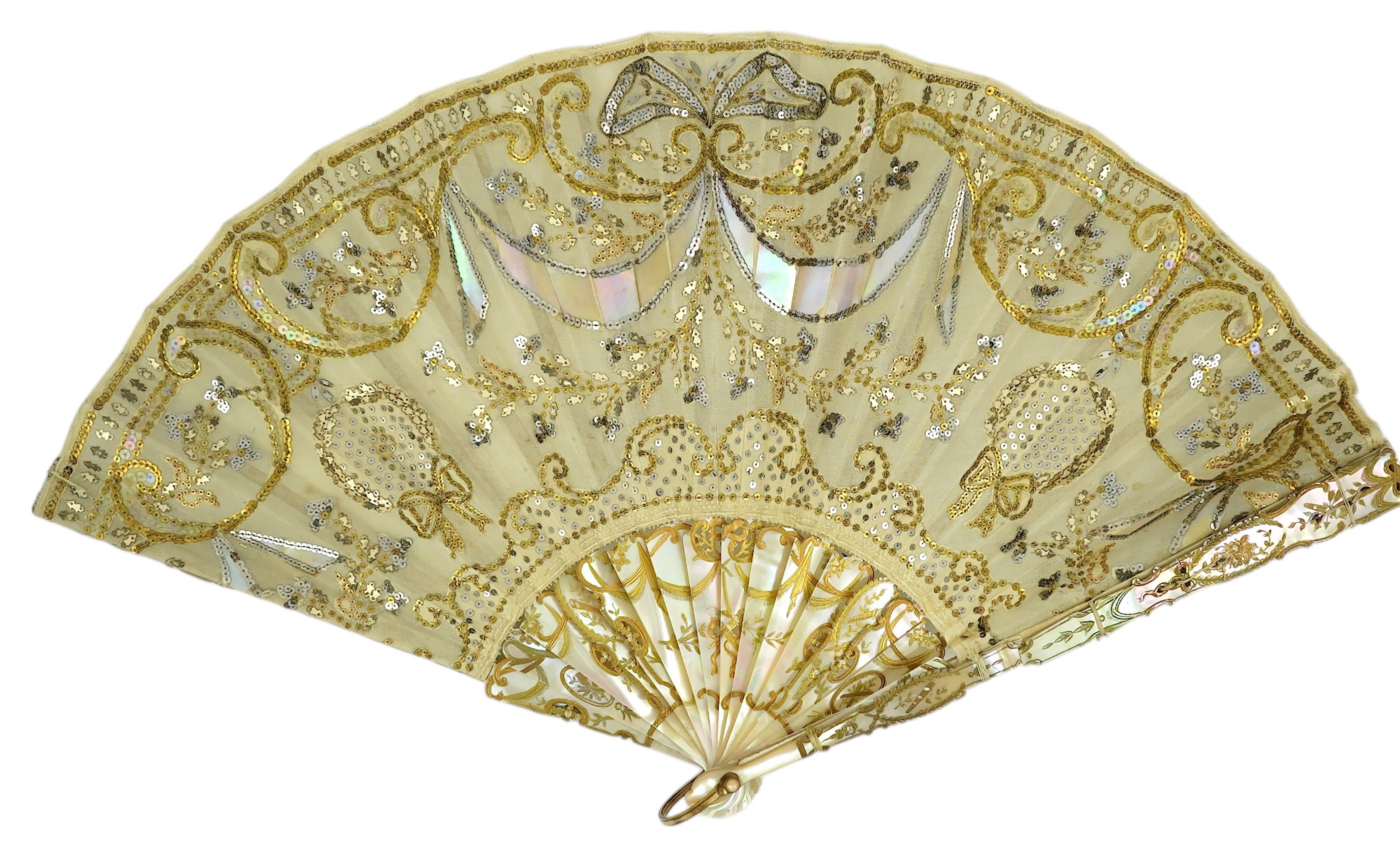 Three French fans: a mother of pearl and sequin fan boxed, a painted silk, feather and bone fan and a gilt decorated bone figural paper fan, the two bone fans having gilt mirrored mounts on the guards, figural paper fan